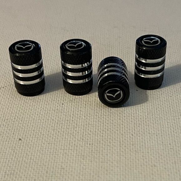 Mazda valve Stem caps in Black set of 4 NWT - Picture 2 of 4